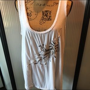 White sleeveless embellished top. Calvin Klein.